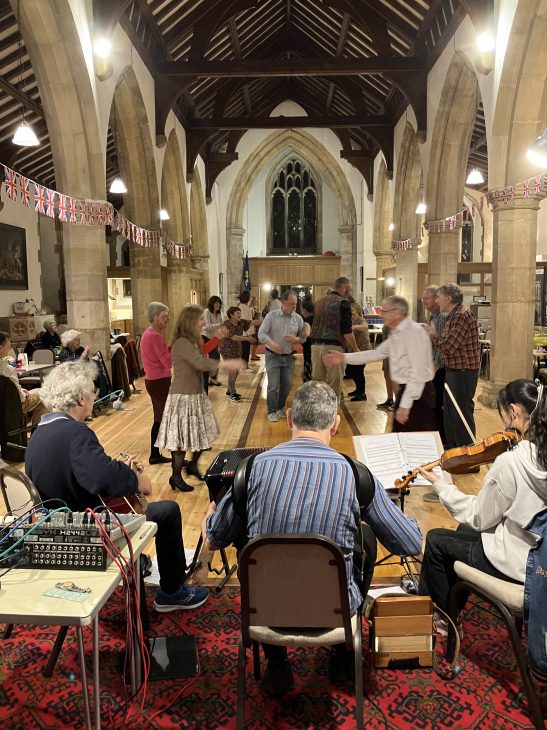 Dancers at the 2023 Ceilidh in the church